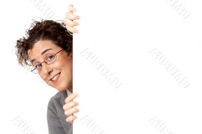 Business woman behind the  blank banner