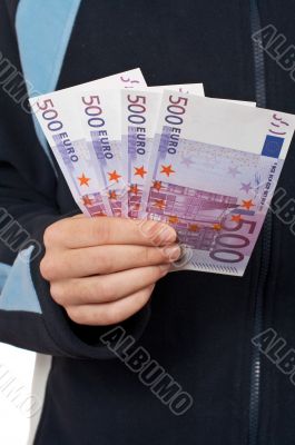 Teenager showing a fan money