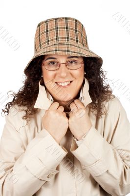 Woman with raincoat and hat