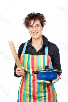 Holding a blue pan and wooden rolling