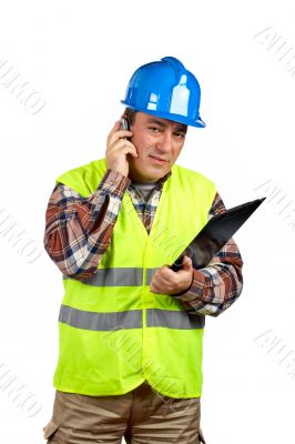 Construction worker talking with cell phone