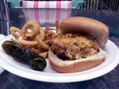 crabcake sandwich with fries and pickle 3