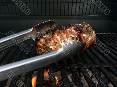 grilled - marinated pork loin on the grill