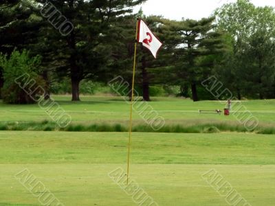 white flag on putting green