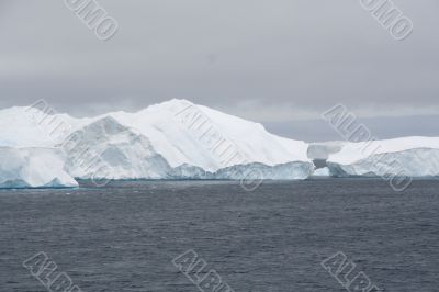 Icy mountains forming icebergs