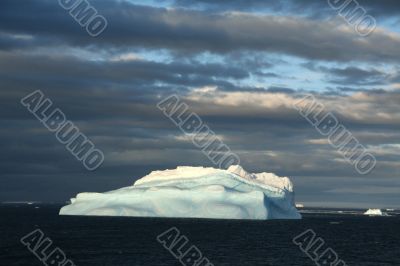 Iceberg with surrealistic blue swirls