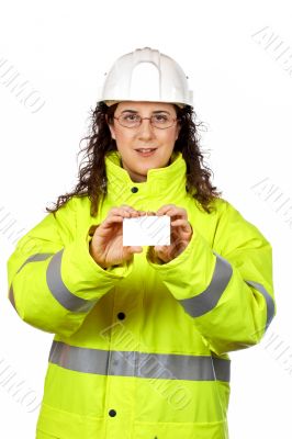 Female construction worker holding one blank card
