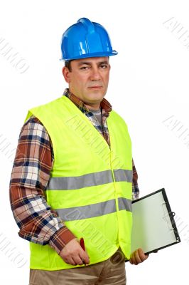 Construction worker with green safety vest