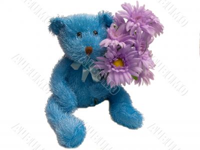 Furry Blue Teddy Bear Holding Flowers