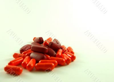 Dark Red and Orange Pills