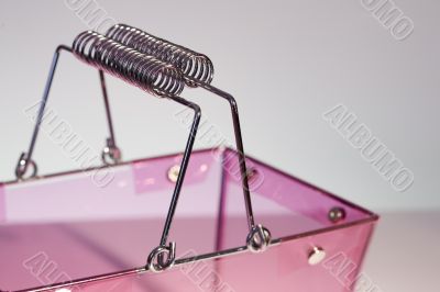 Detail of a pink shopping bag