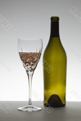 Wine glass and bottle