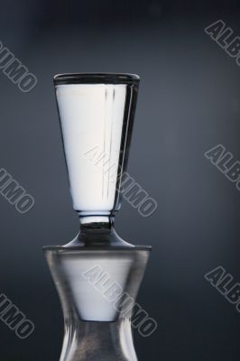 Glass decanter with stop detail