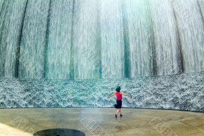 Happy woman at fountain