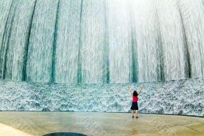 Awestruck woman at fountain