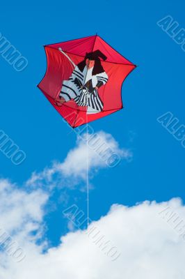 japanese red kite in flight in summer day