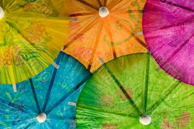 colored summer cocktail umbrella background