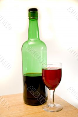 Wine bottle and glass
