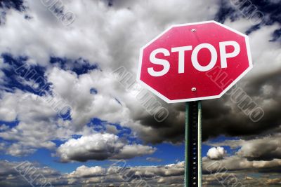 Stop sign with cloud background