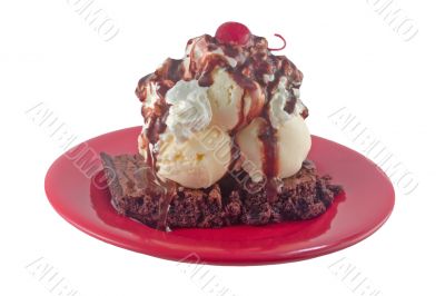 brownie ice cream sundae on white