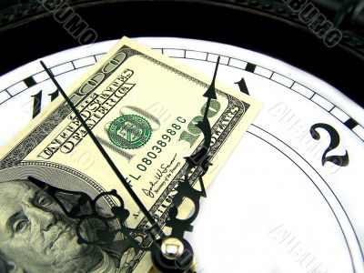 Watches and dollars.