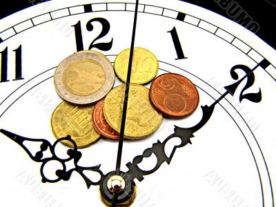Watches and coins of euro.