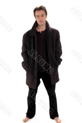 The  man in black clothes on a white background