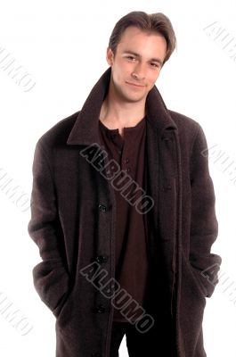 Smiling the man in dark clothes