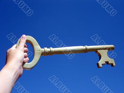 hand holding a key