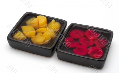 Fresh fruit salad on the two black bowls