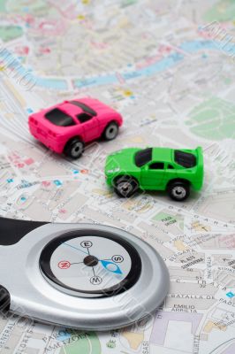 Compass and two cars, on the map