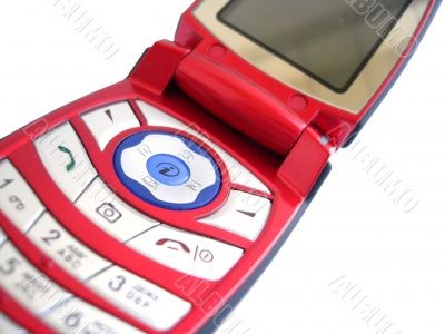 Red mobile phone over a white background