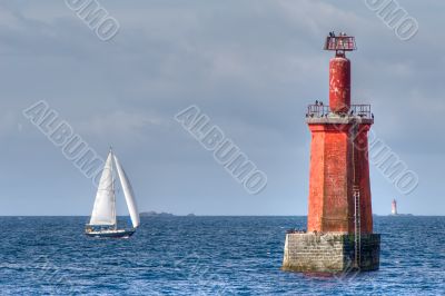 sailboat and lighthouse