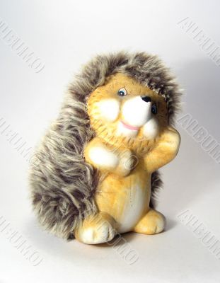 Funny toy of little fluffy hedgehog