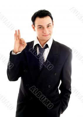 friendly businessman showing ok sign