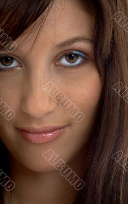 closeup portrait of smiling brunette