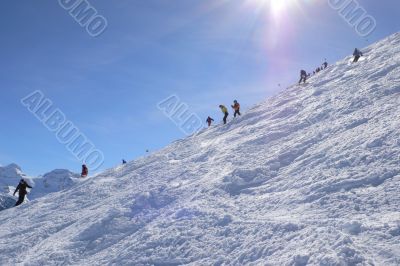 Skiers on Cubere run