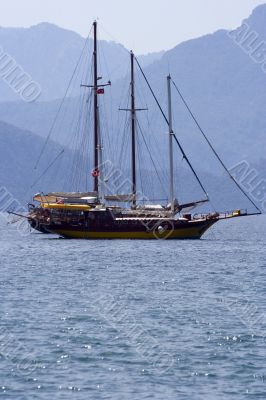 a pair of yachts at anchor