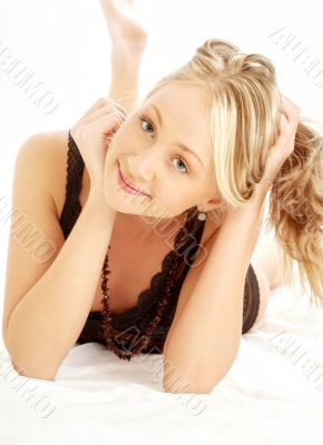 happy blond in bed