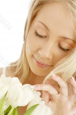cheerful blond with white tulips