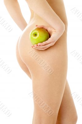 naked woman with green apple