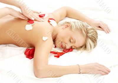 massage with flower petals