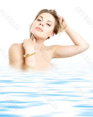 golden bracelet girl in water