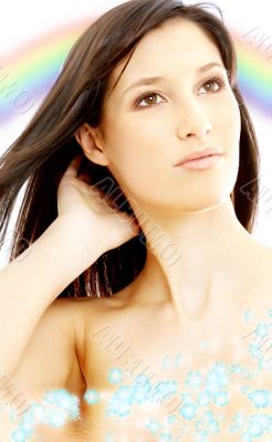rainbow brunette in water with flowers