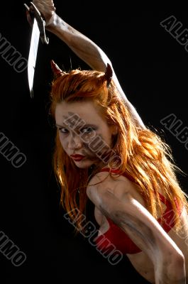 red devil girl with a knife