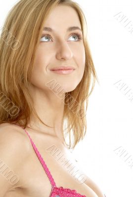 lovely girl in pink bra looking up