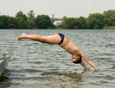little boy jumps