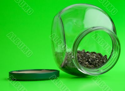 Green tea in glass jar