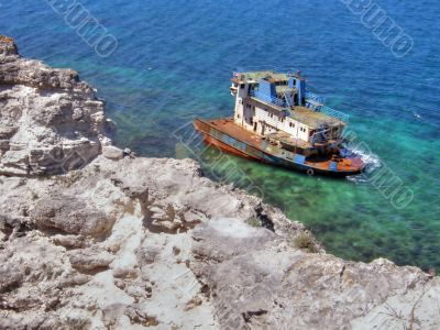 destroyed ship in the sea.