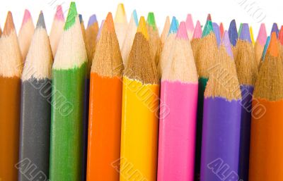 coloured pencils in a row